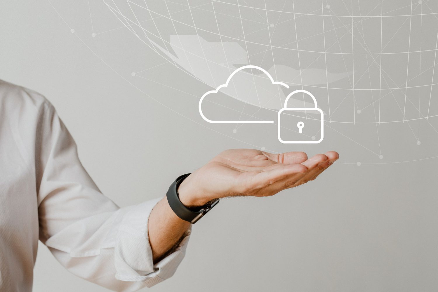 A person's hand is extended with a cloud symbol above it, representing secure cloud computing.